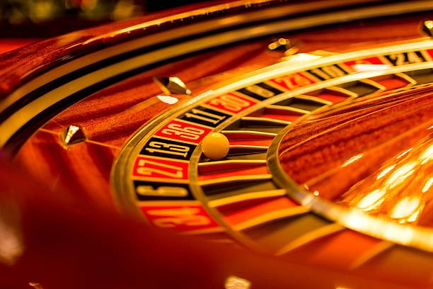 Live dealer studio with professional croupier at blackjack table